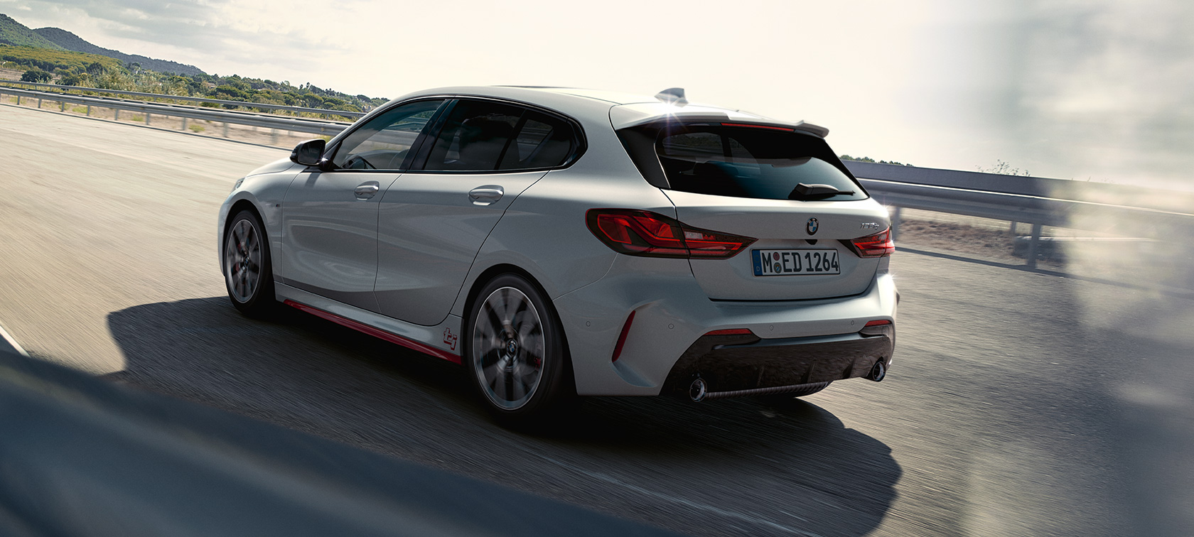BMW 1 Series 128ti F40, three-quarter rear view BMW 1 Series 128ti F40, three-quarter rear view driving
