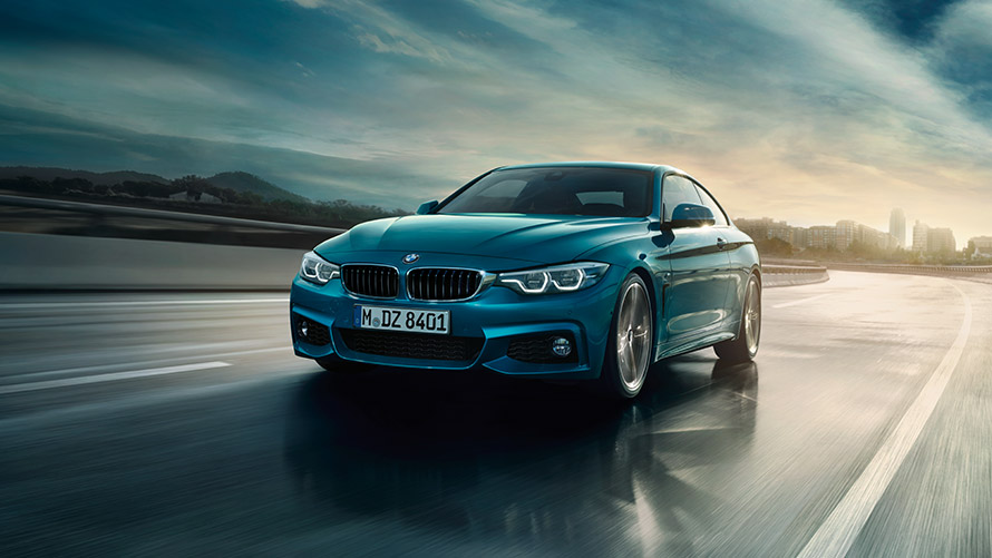 BMW 4 Series Coupé F32 three-quarter front view on the road BMW 4 Series BMW 4 Series Coupé F32 first generation three-quarter front view on the road
