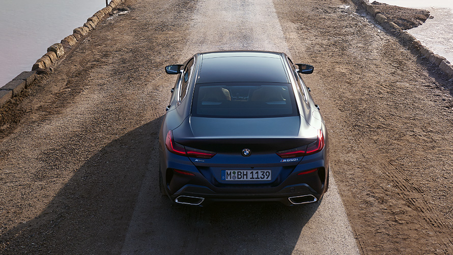 BMW M850i xDrive Gran Coupé G16 LCI Facelift 2022 BMW Individual Frozen Tanzanite Blue metallic rear from bird’s eye view