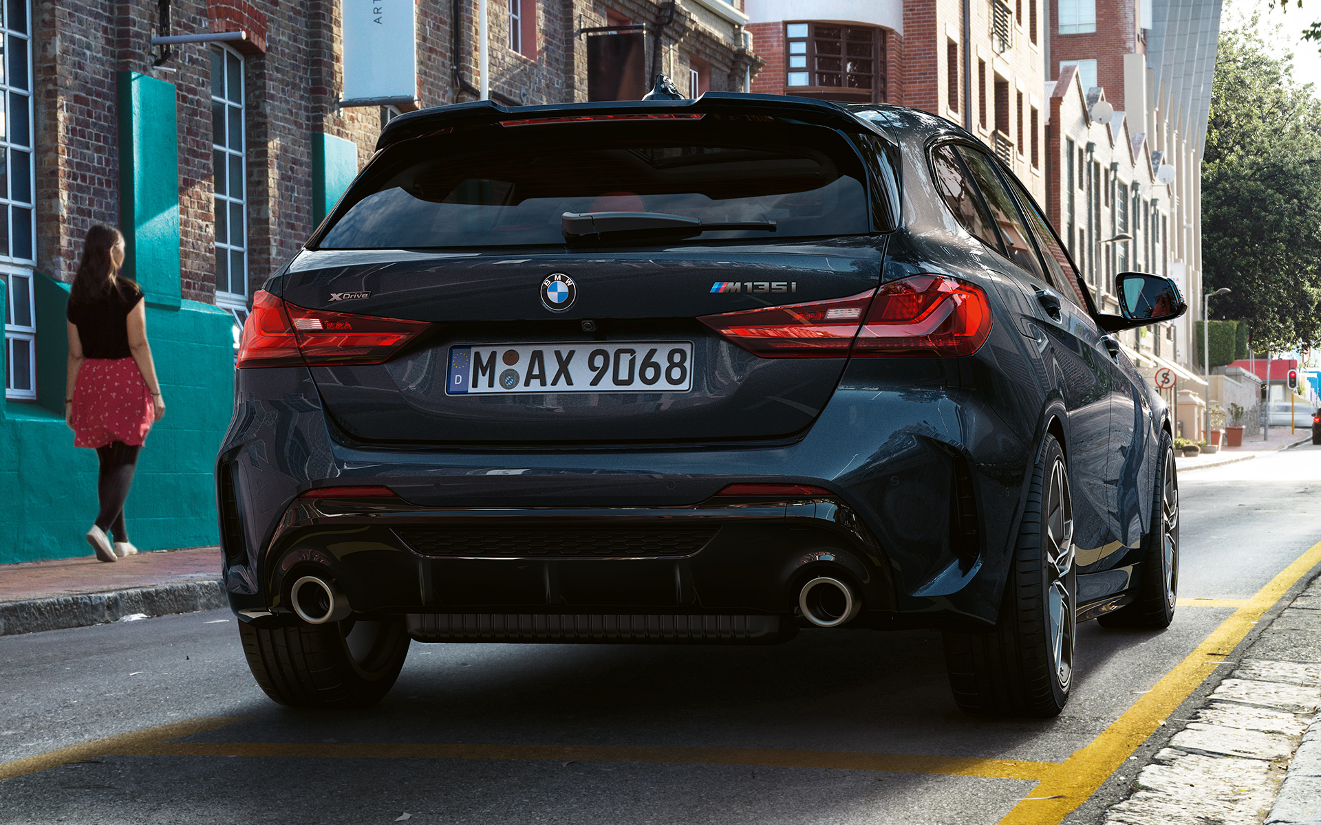 BMW M135i xDrive (F40) in Black Sapphire metallic, rear view parking