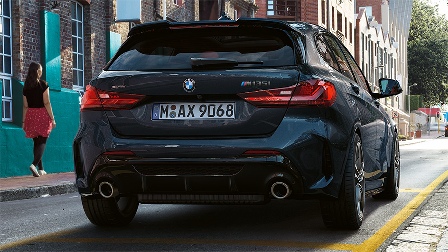 BMW M135i xDrive (F40) in Black Sapphire metallic, rear view parking