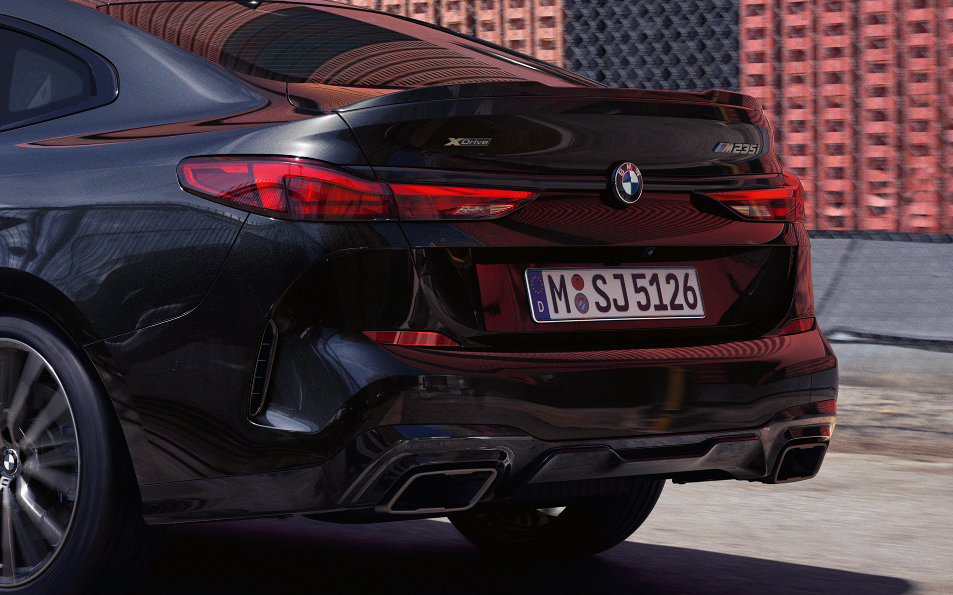 Athletic rear section BMW M235i xDrive Gran Coupé F44 2020 Black Sapphire metallic three-quarter rear view