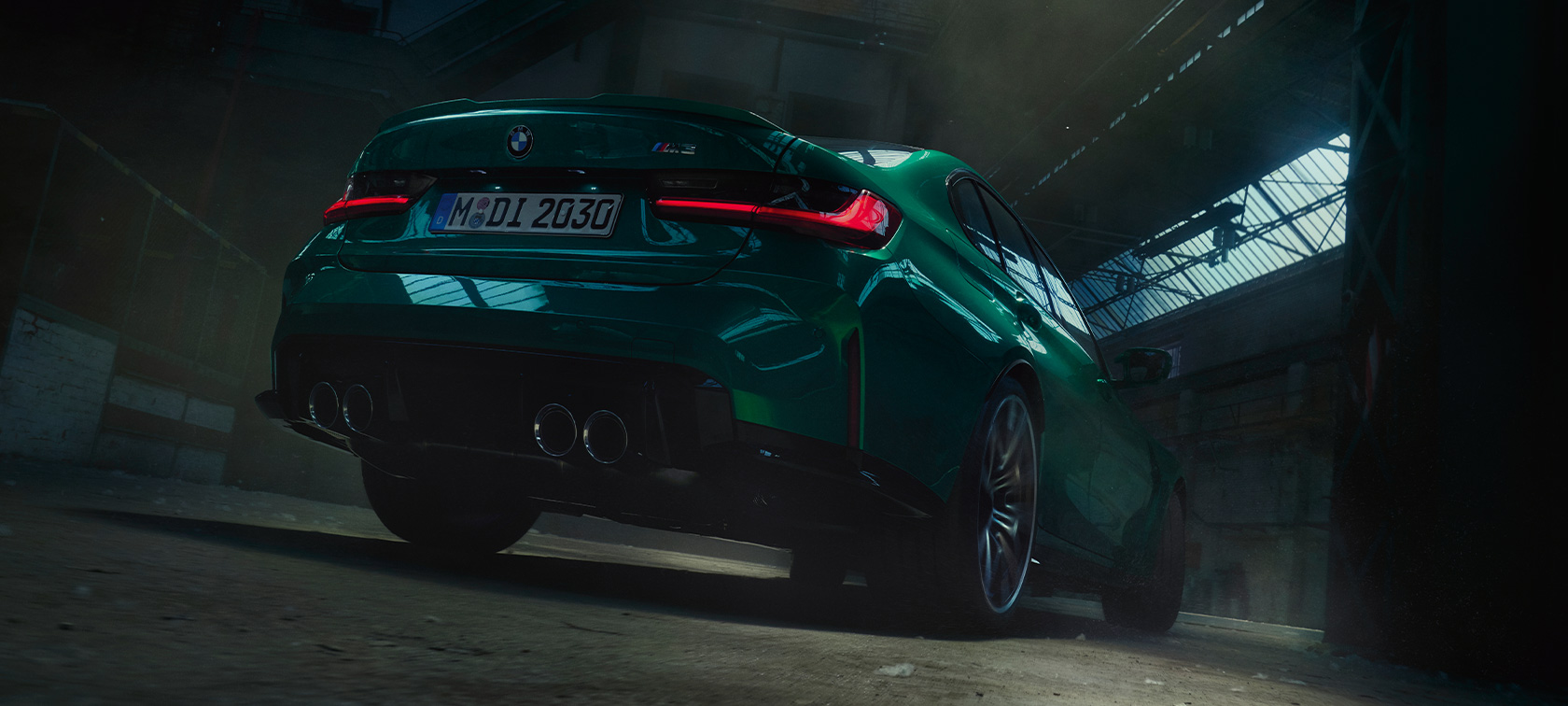 BMW M3 Sedan G80 2020 three-quarter rear worm's-eye view BMW M3 Sedan G80 2020 Isle of Man Green metallic three-quarter rear view worm's-eye view