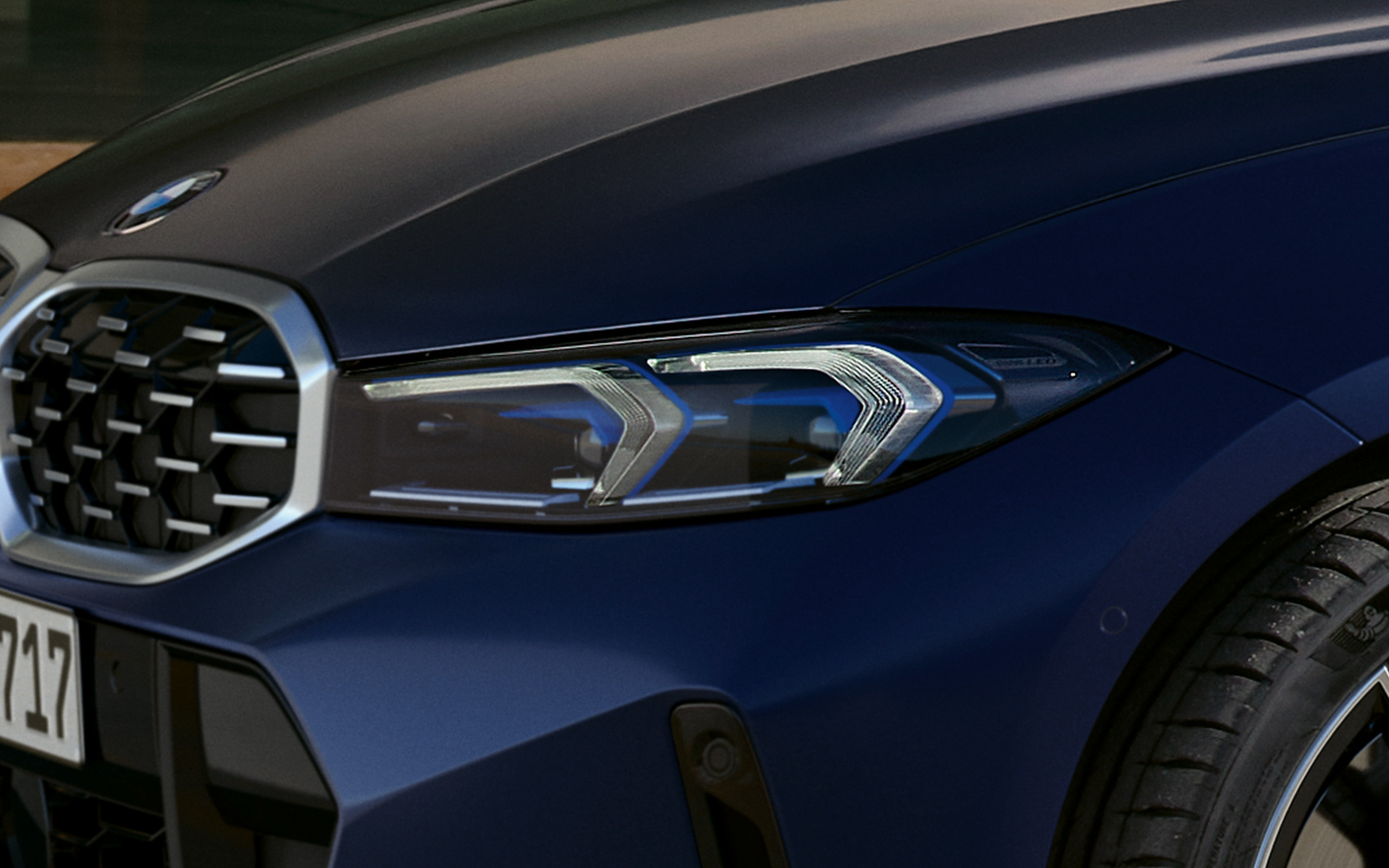 BMW M340i xDrive Touring G21 Frozen Tanzanite Blue LED front lights close-up