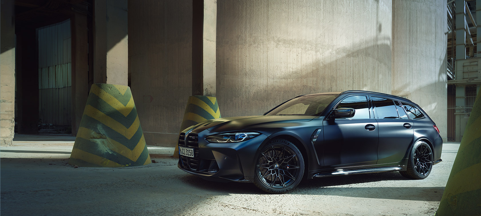 Side view BMW M3 Competition Touring G81 BMW M3 Competition Touring G81 BMW Individual Frozen Black metallic side view standing