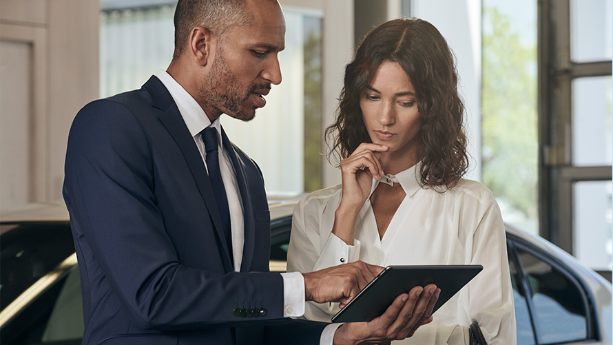 BMW service employee consults customer BMW service employee consults customer