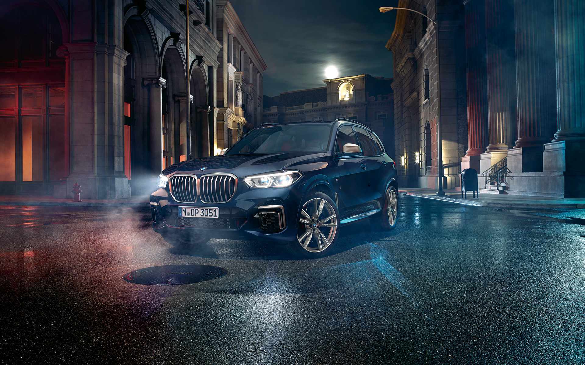 Headlights with X Laserlight BMW X5 M50i and M50d G05 2018 SUV Carbon black metallic three-quarter front view