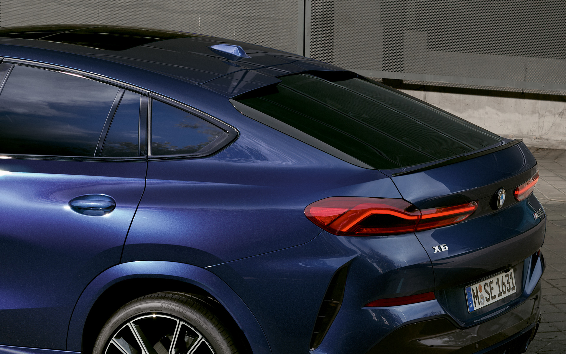 BMW X6 M60i xDrive G06 MP rear BMW X6 M60i xDrive G06 MP rear close-up