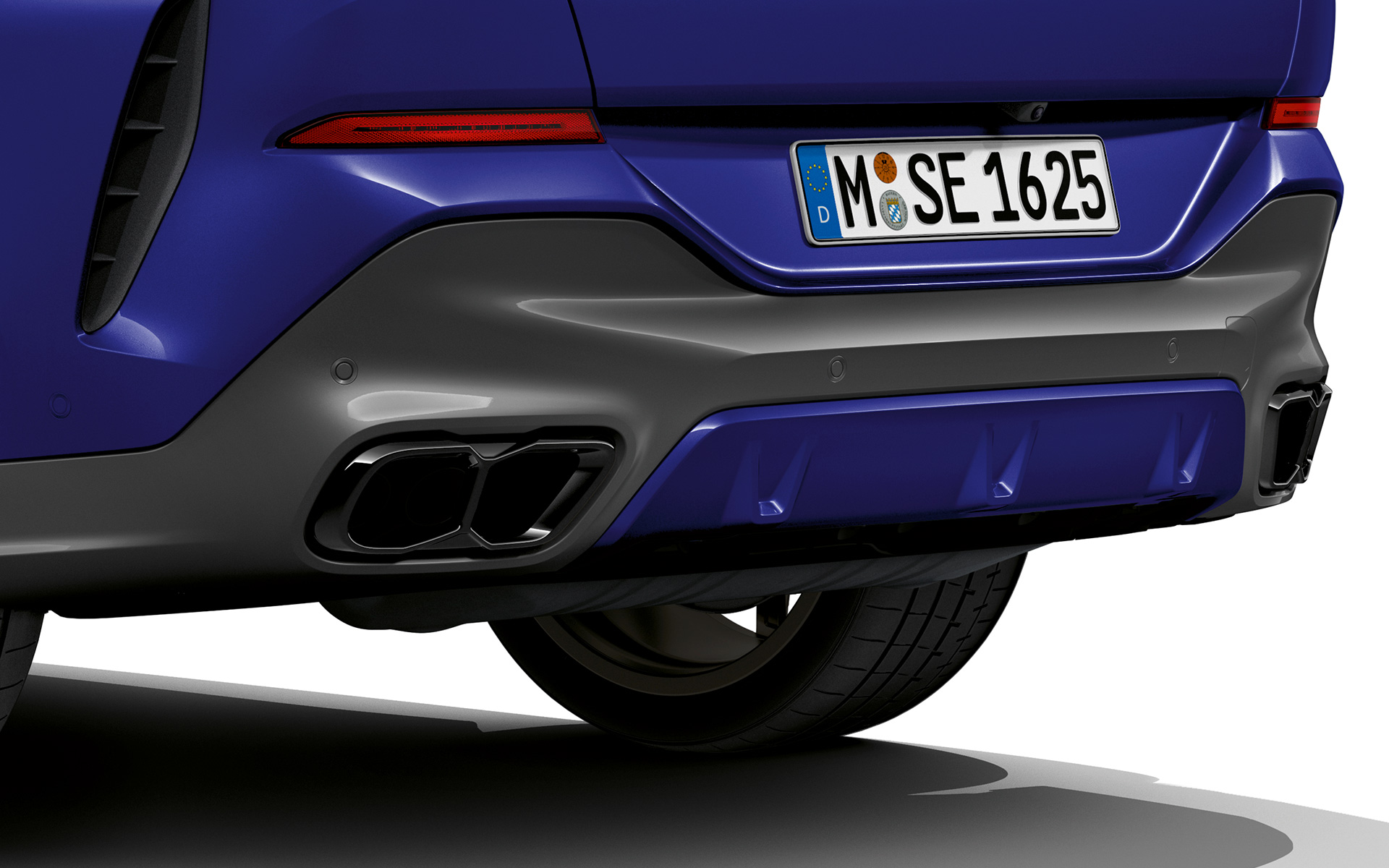 BMW X6 M60i xDrive G06 MP exhaust system close-up 