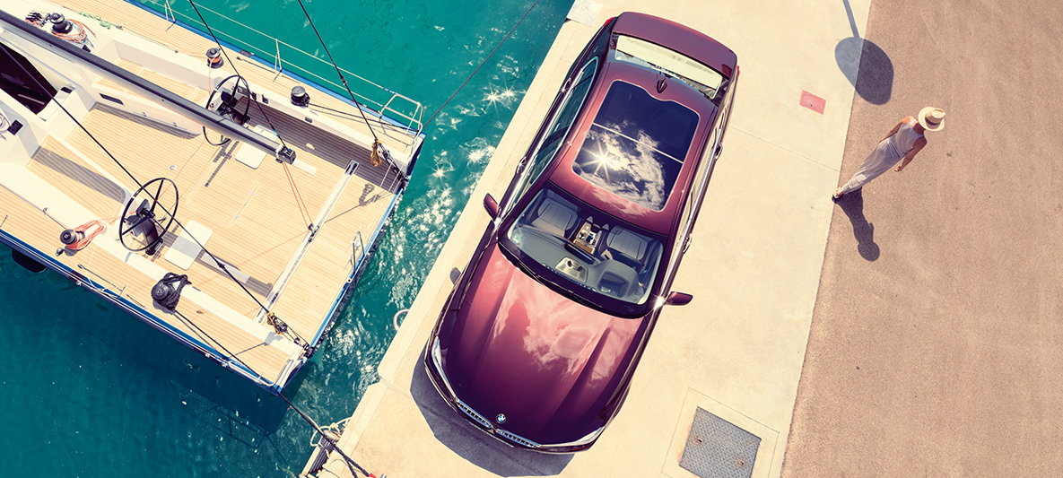 BMW Individual M760Li inspired by Nautor's Swan The bird's eye view of the BMW Individual M760Li inspired by Nautor's Swan in a maritime setting