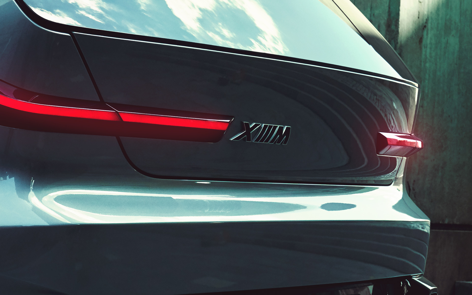 BMW Concept XM (G09) Three-quarter rear view standing close-up XM Logo BMW Concept XM (G09) Three-quarter rear view standing close-up XM Logo
