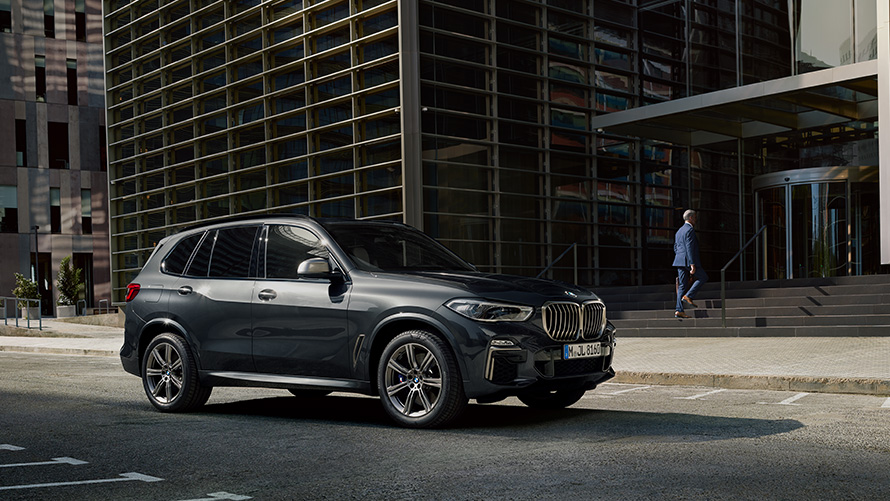 BMW Protection Vehicles BMW driving on the street in the city  